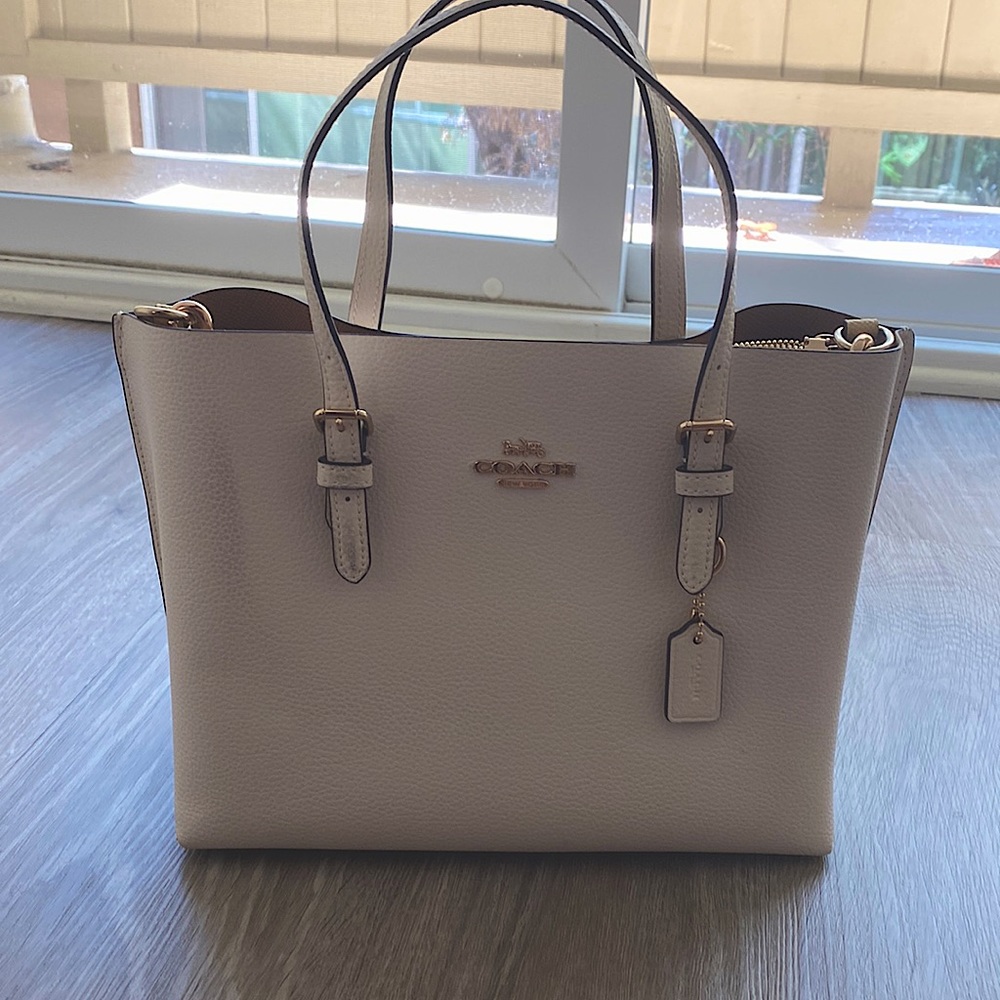 Small coach bag! Has crossbody straps, barely used!